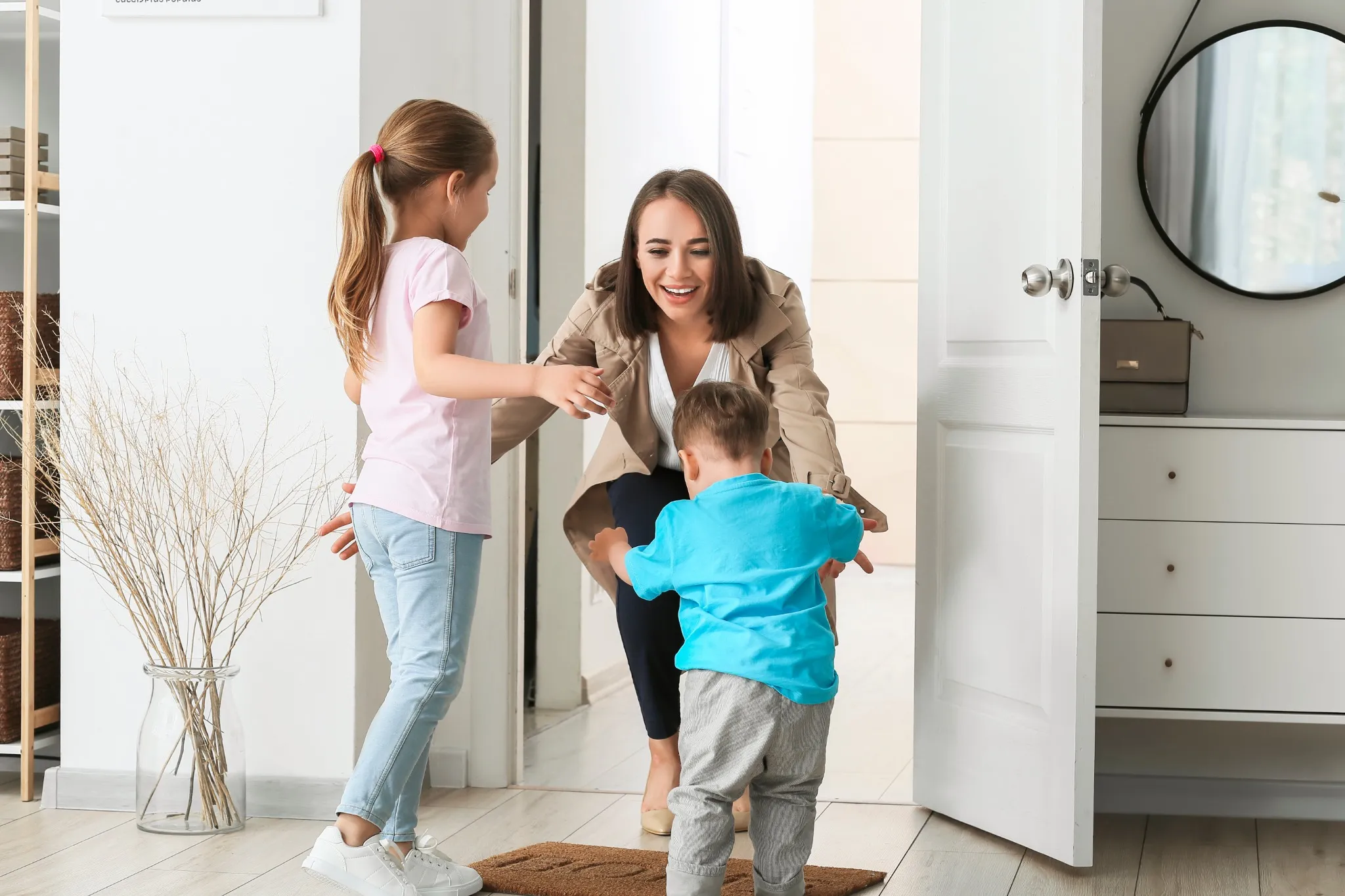 Mother coming home from walk and getting hugs