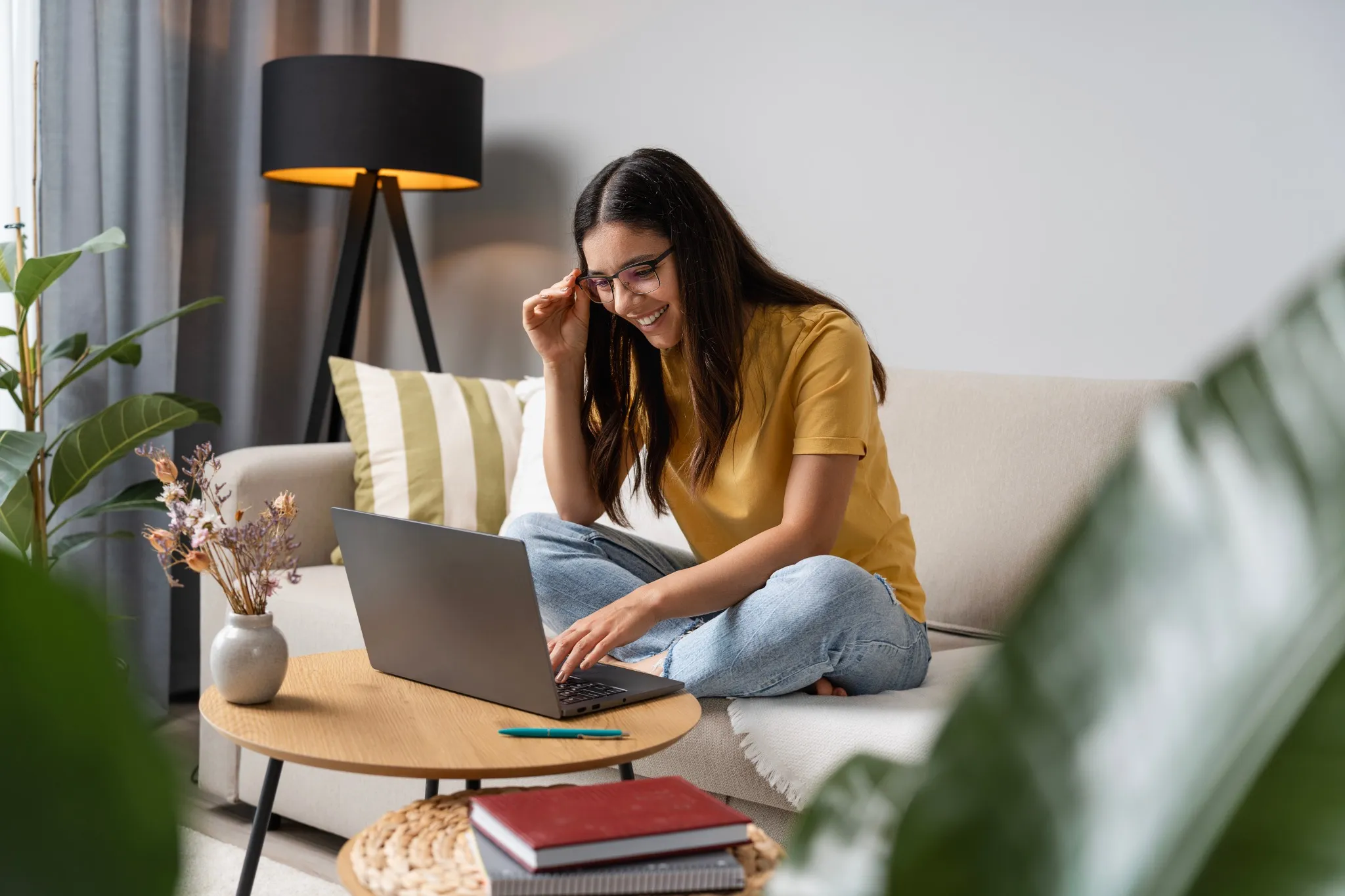 Woman studying on the couch