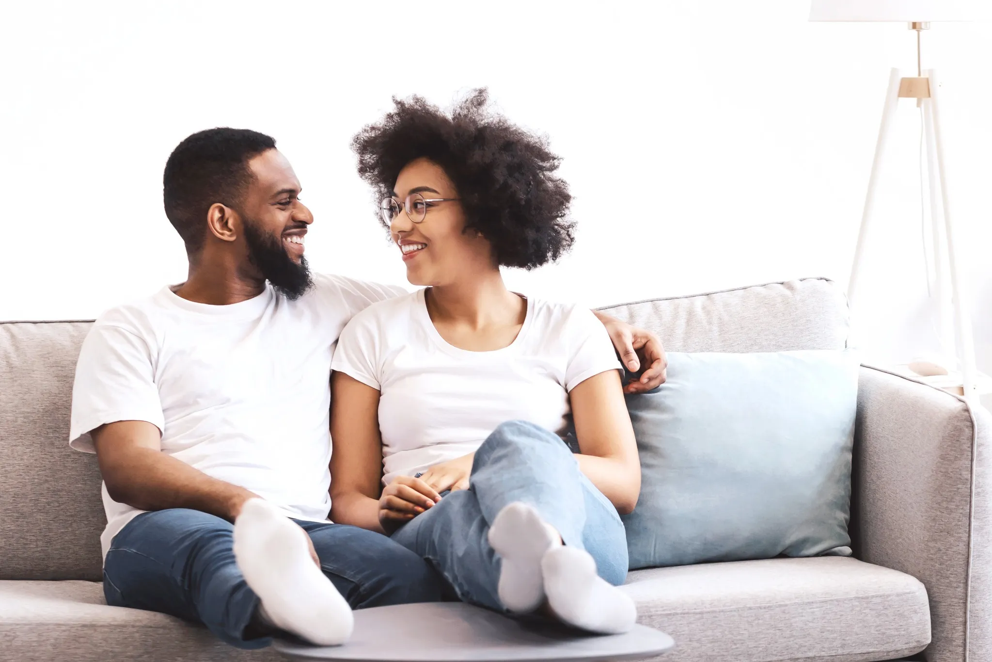 Couple sitting on couch