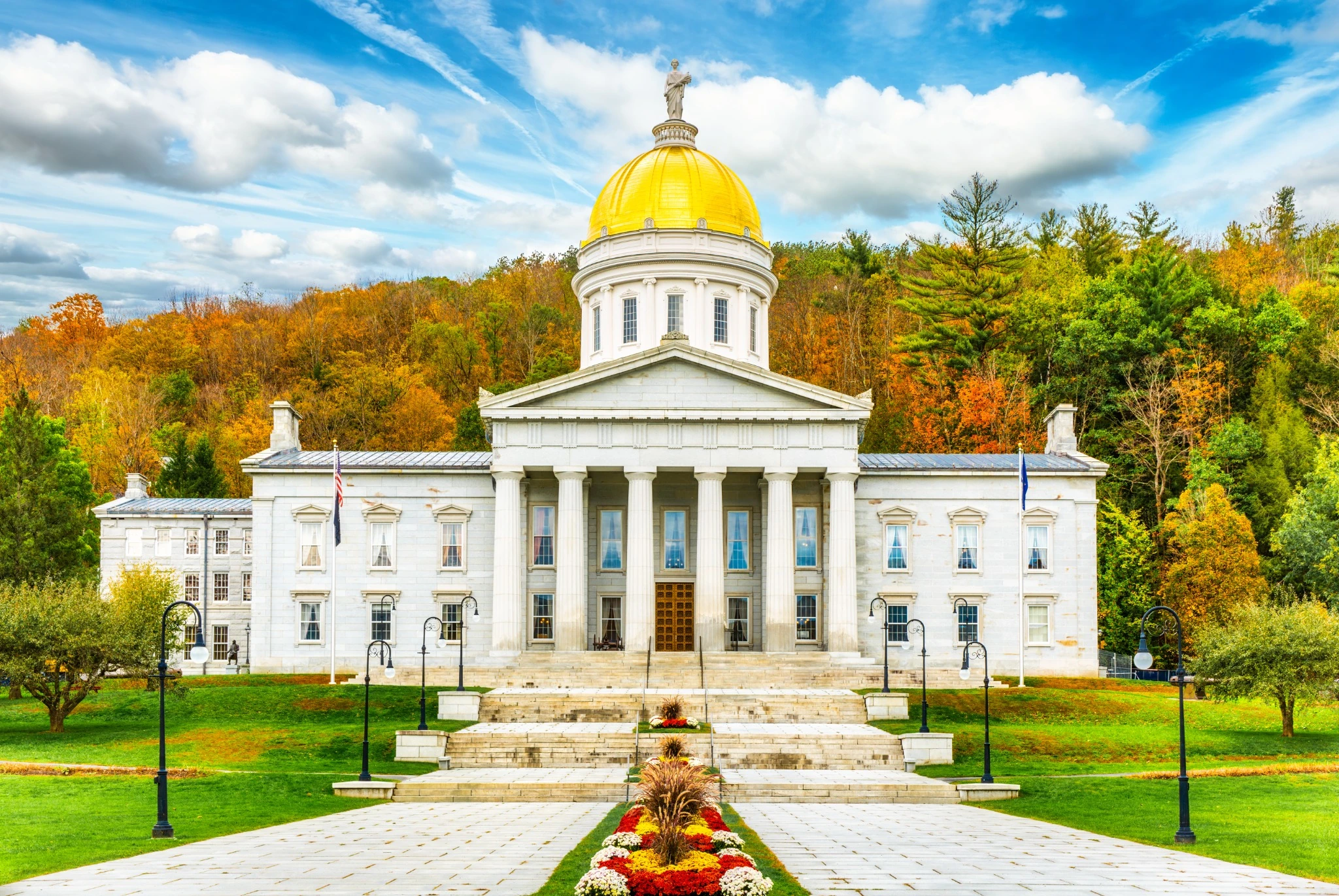 Frontal view of Vermont State House, in Montpelier, VT with fall foliage colors. This capitol is a public building and the seat of the Vermont General Assembly..jpg