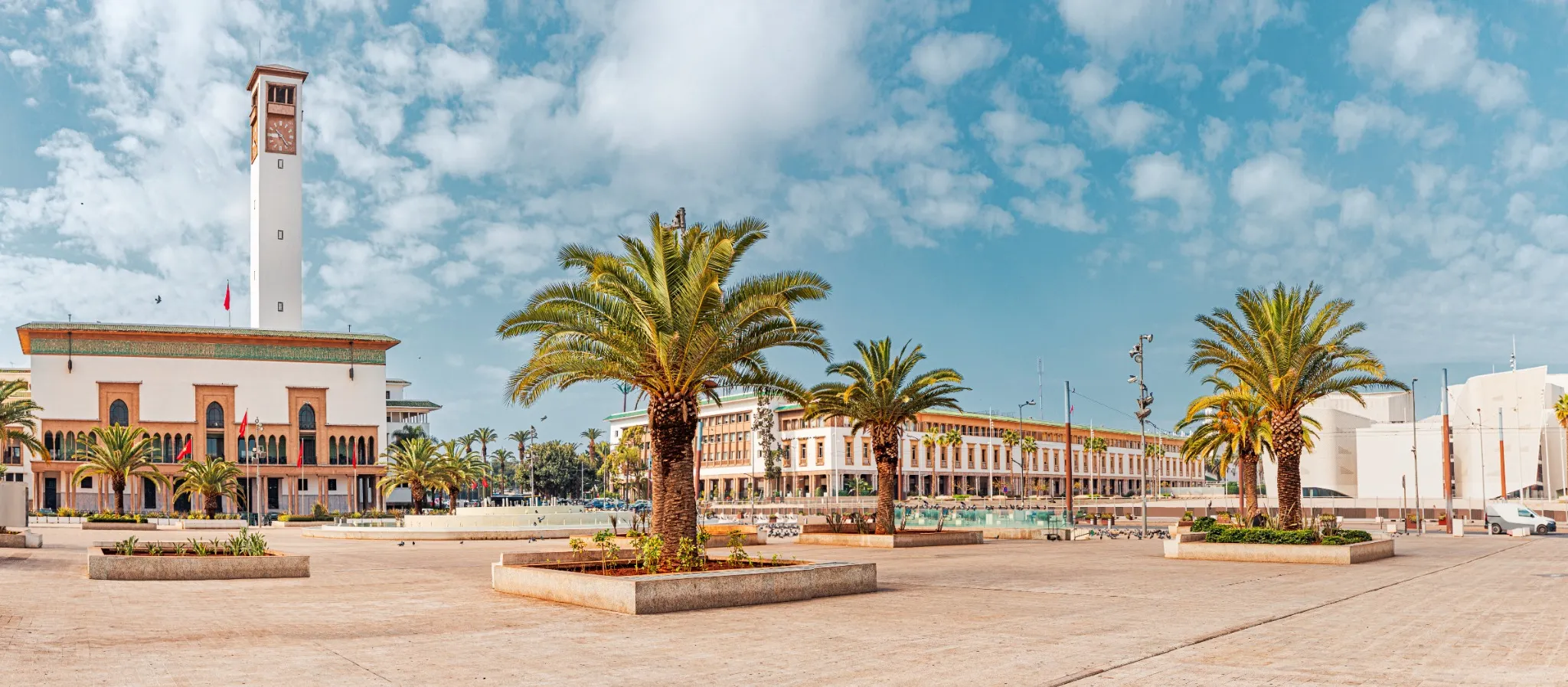 Panoramic view of Mohammed V square with Wilaya building, palm trees in Casablanca, Morocco.