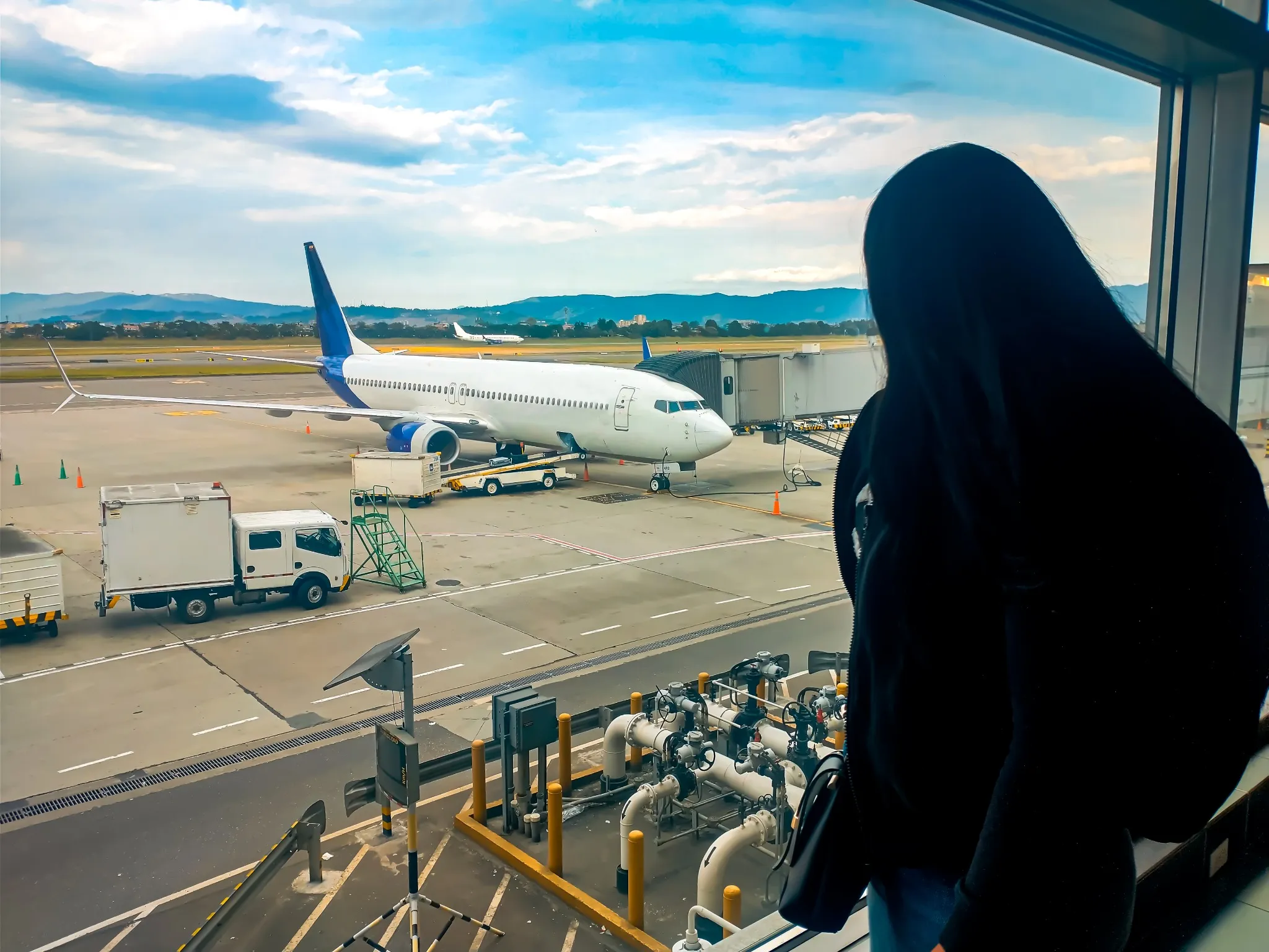 Waiting at airport windows