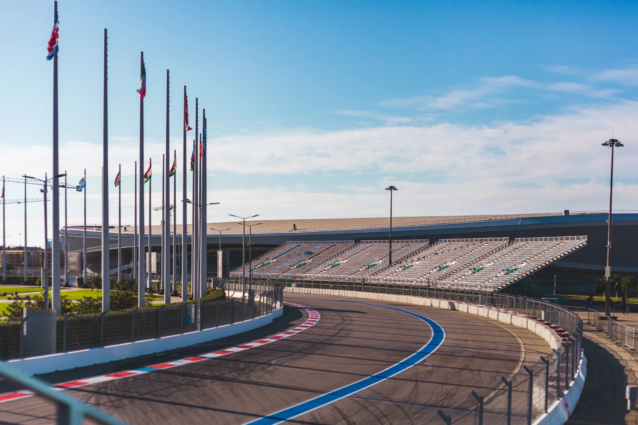 Formula 1 race track, spectator stands.