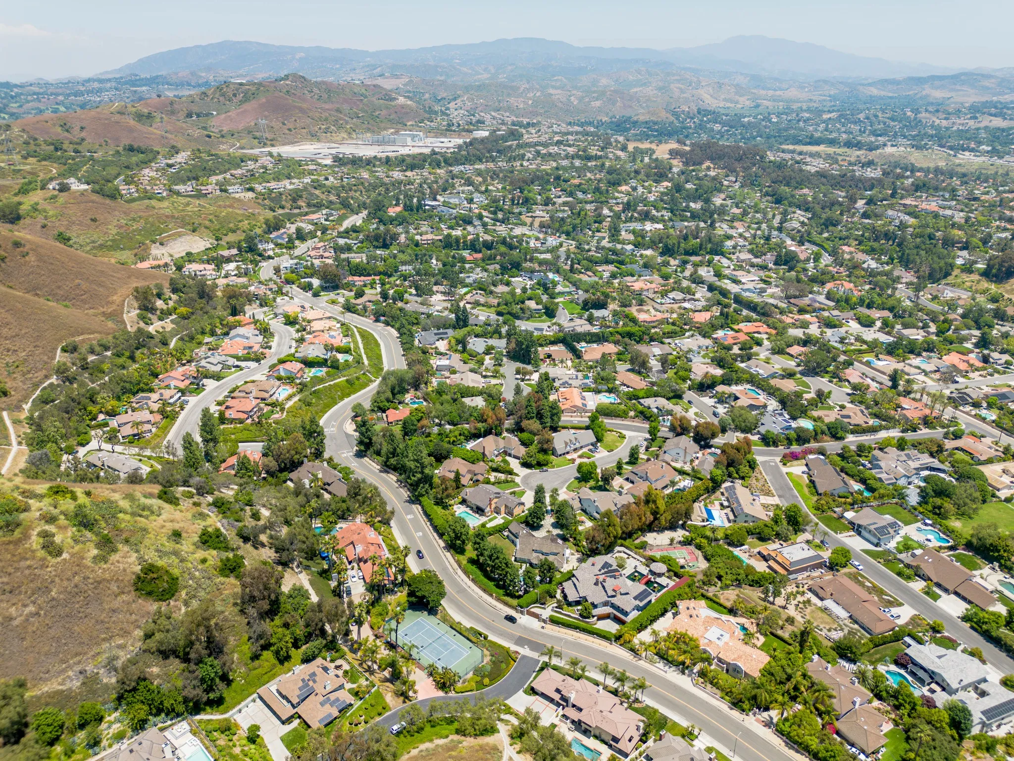 Orange, California - June 17, 2023_ aerial drone photo view toward Orange in Orange County including Villa Park, Orange Hills, Meats Ave, Cannon St, Taft Ave_.