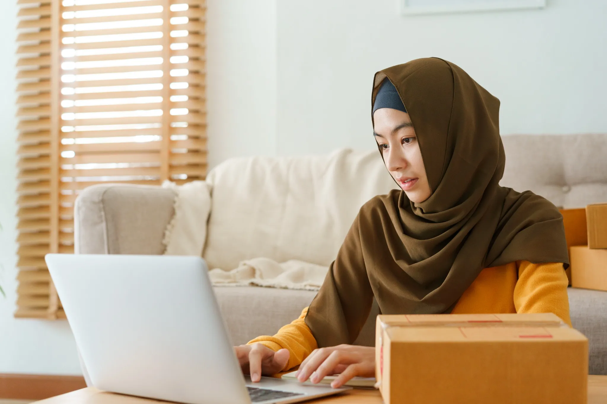 woman working at home on laptop