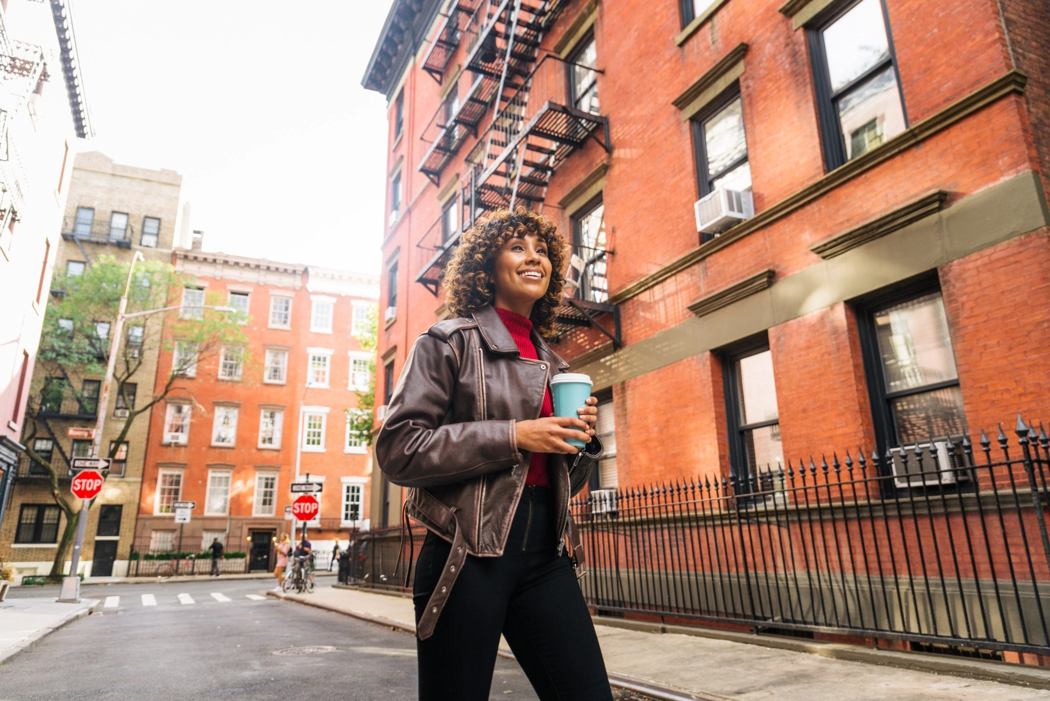 Woman walking down the street in Brooklyn NY