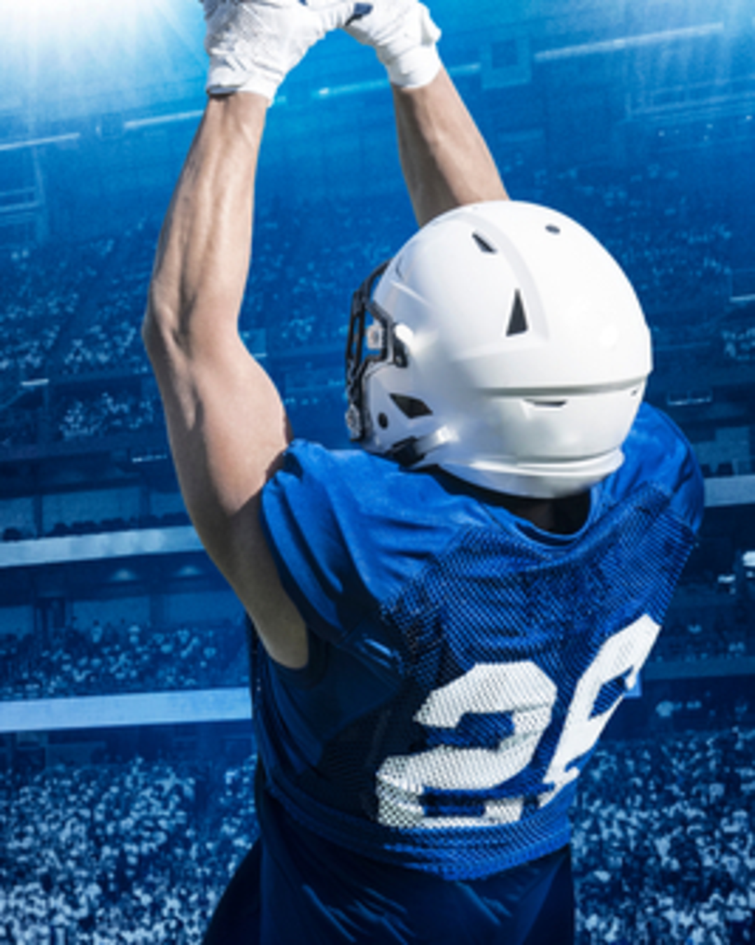 Football player catching a ball