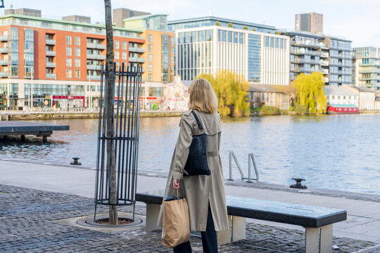 Woman walking along the grand canal in the daytime