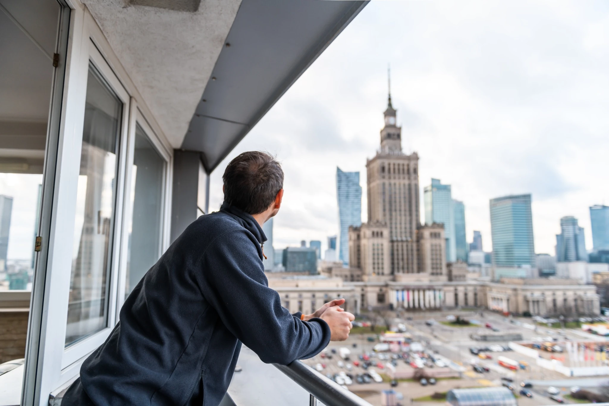 Man on Balcony