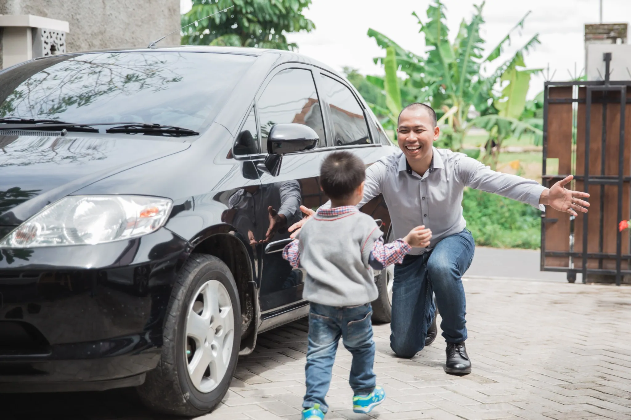 son running into Dad's arms