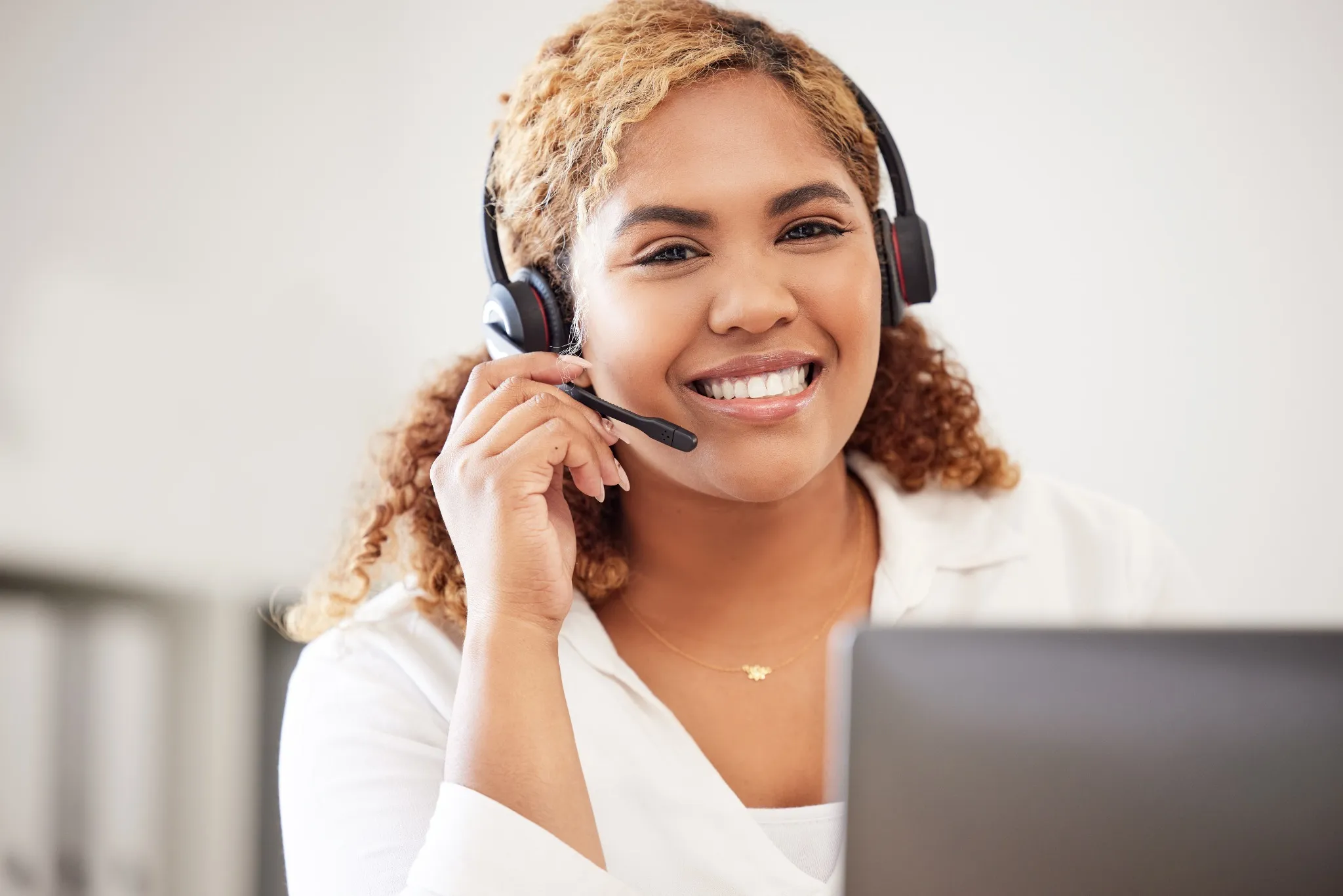 Woman smiling with headset