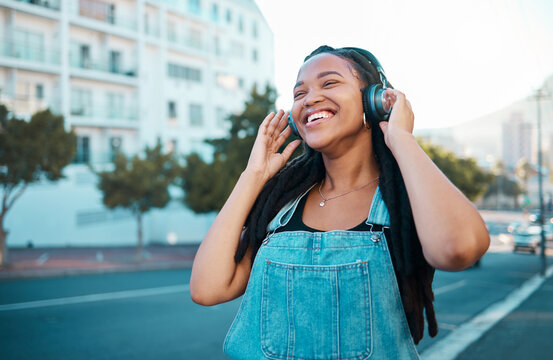 Woman listening to music walking