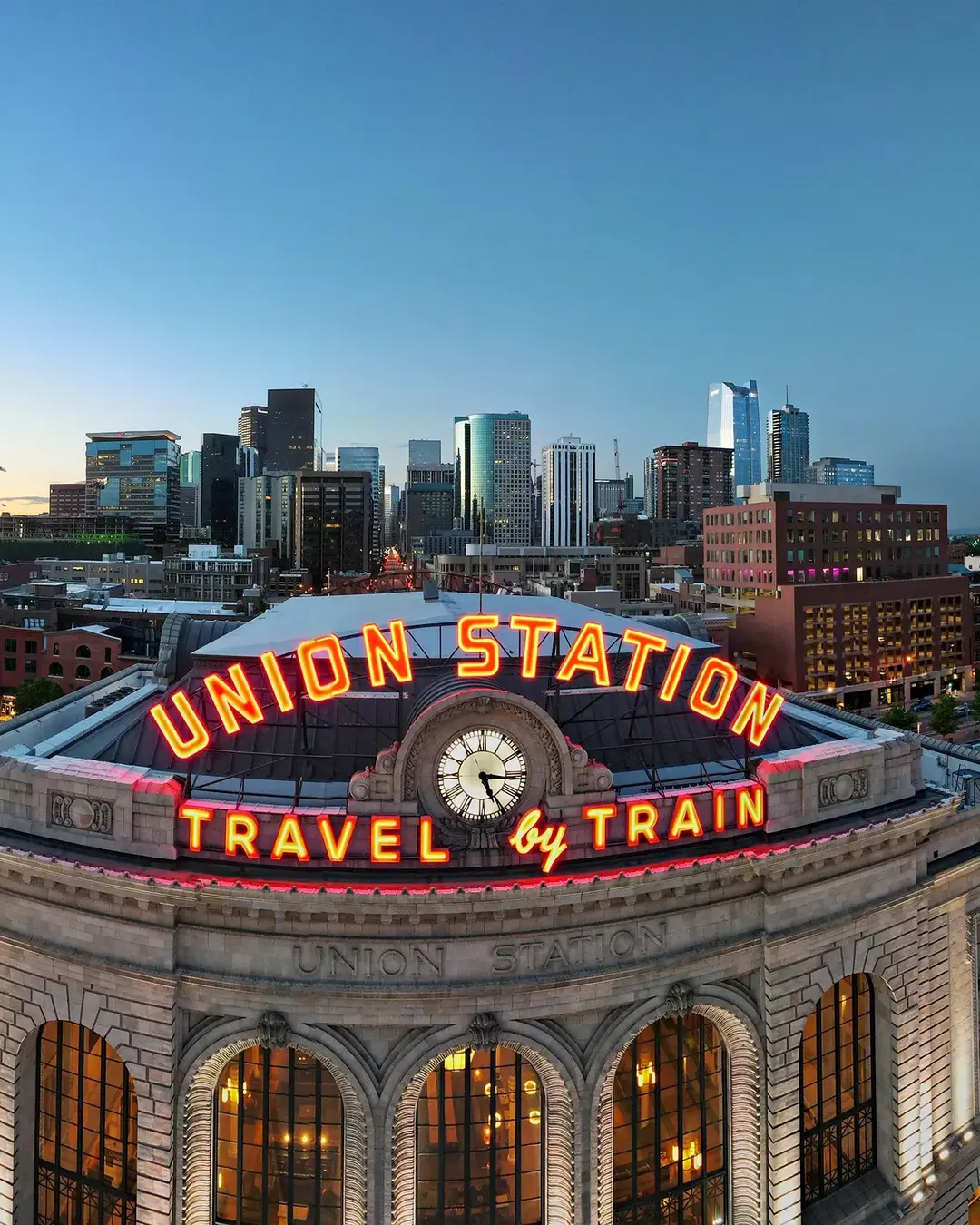 Union Station Denver, CO lit up at sunrise