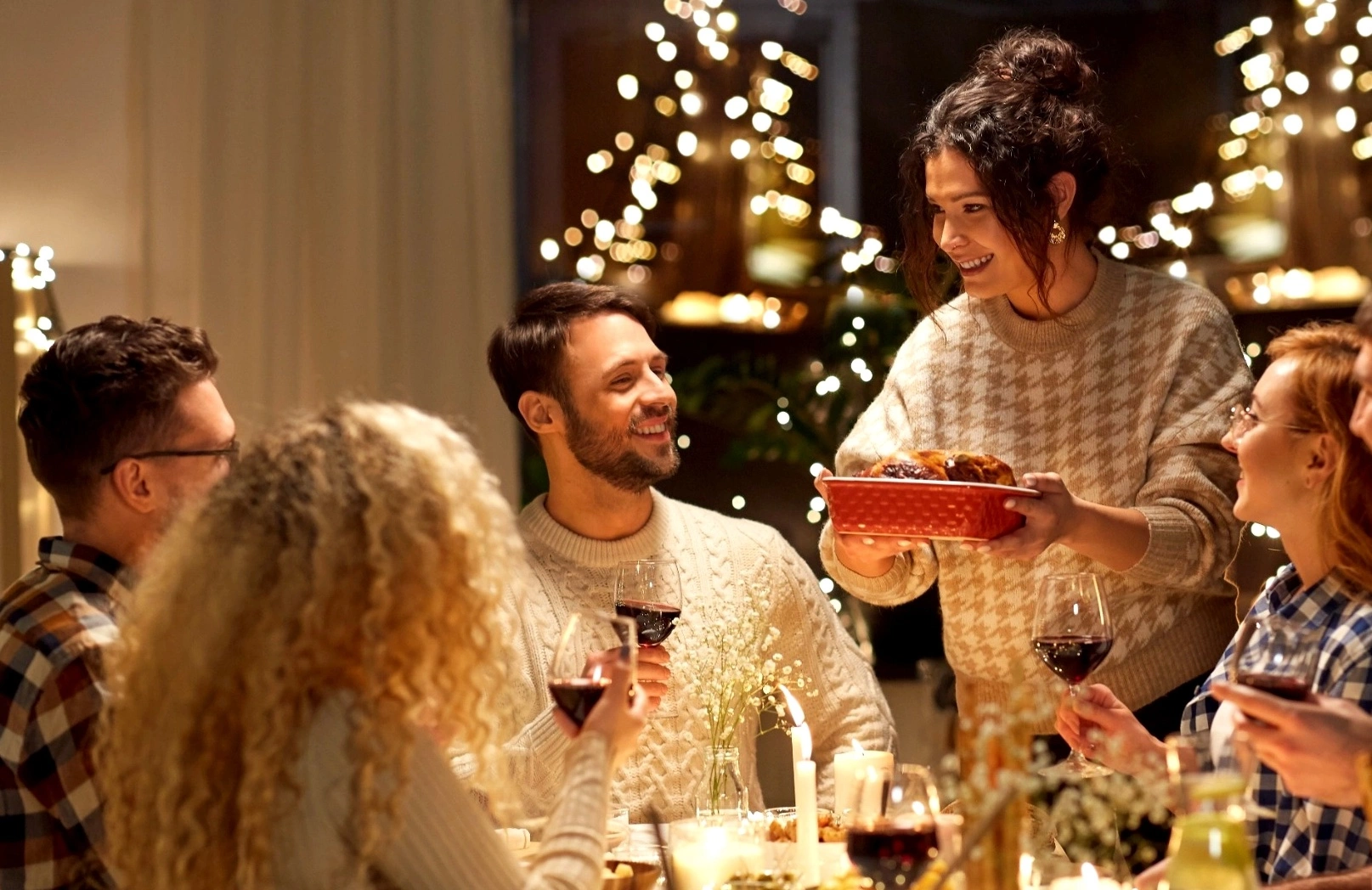 Friends or colleagues celebrating holiday dinner together
