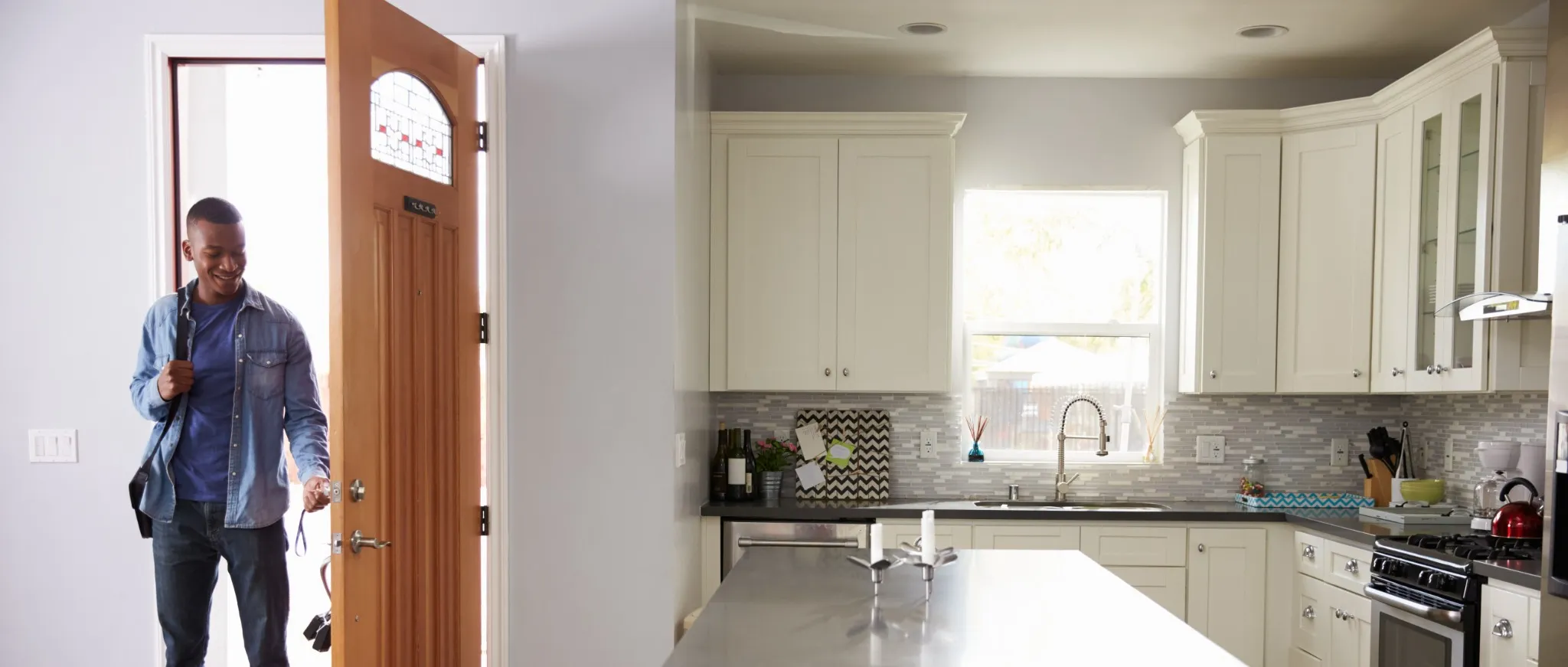 Man walking into home