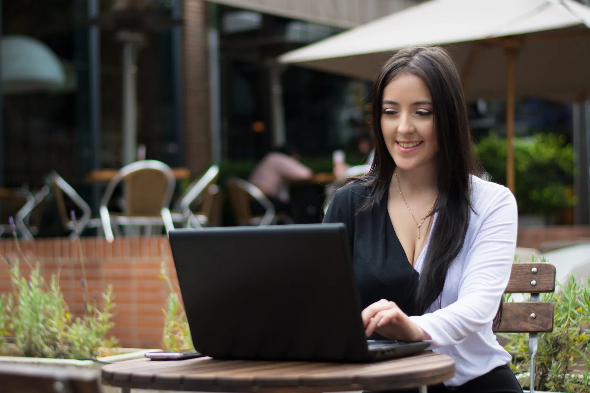 Young woman working outdoors
