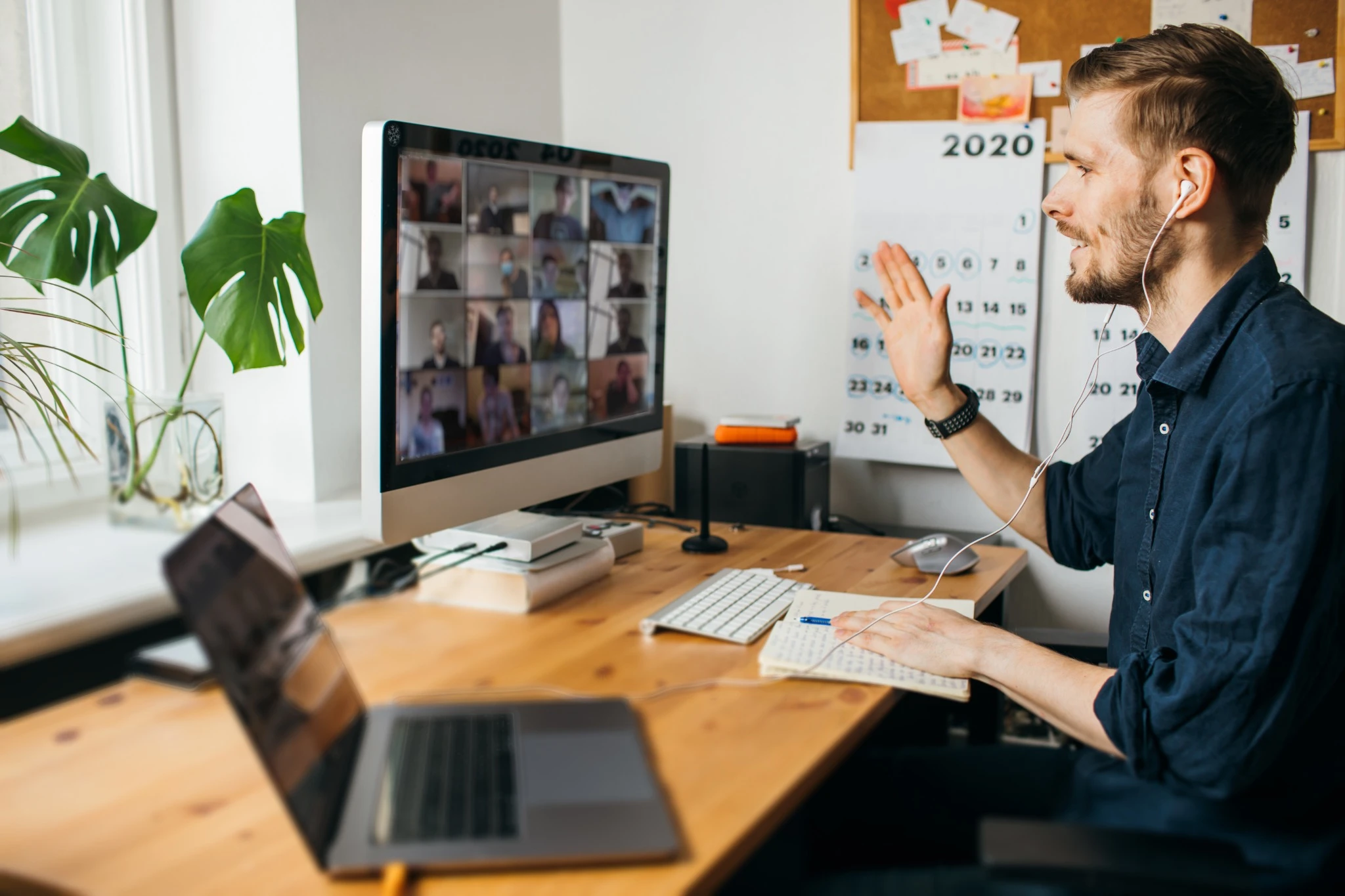Young man on group zoom call