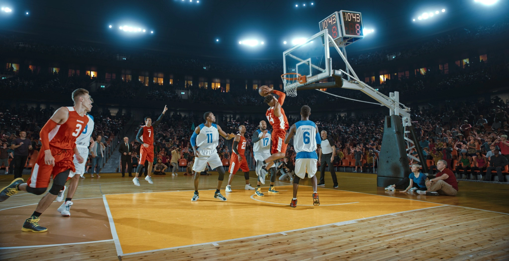 Player going up for a dunk during basketball game