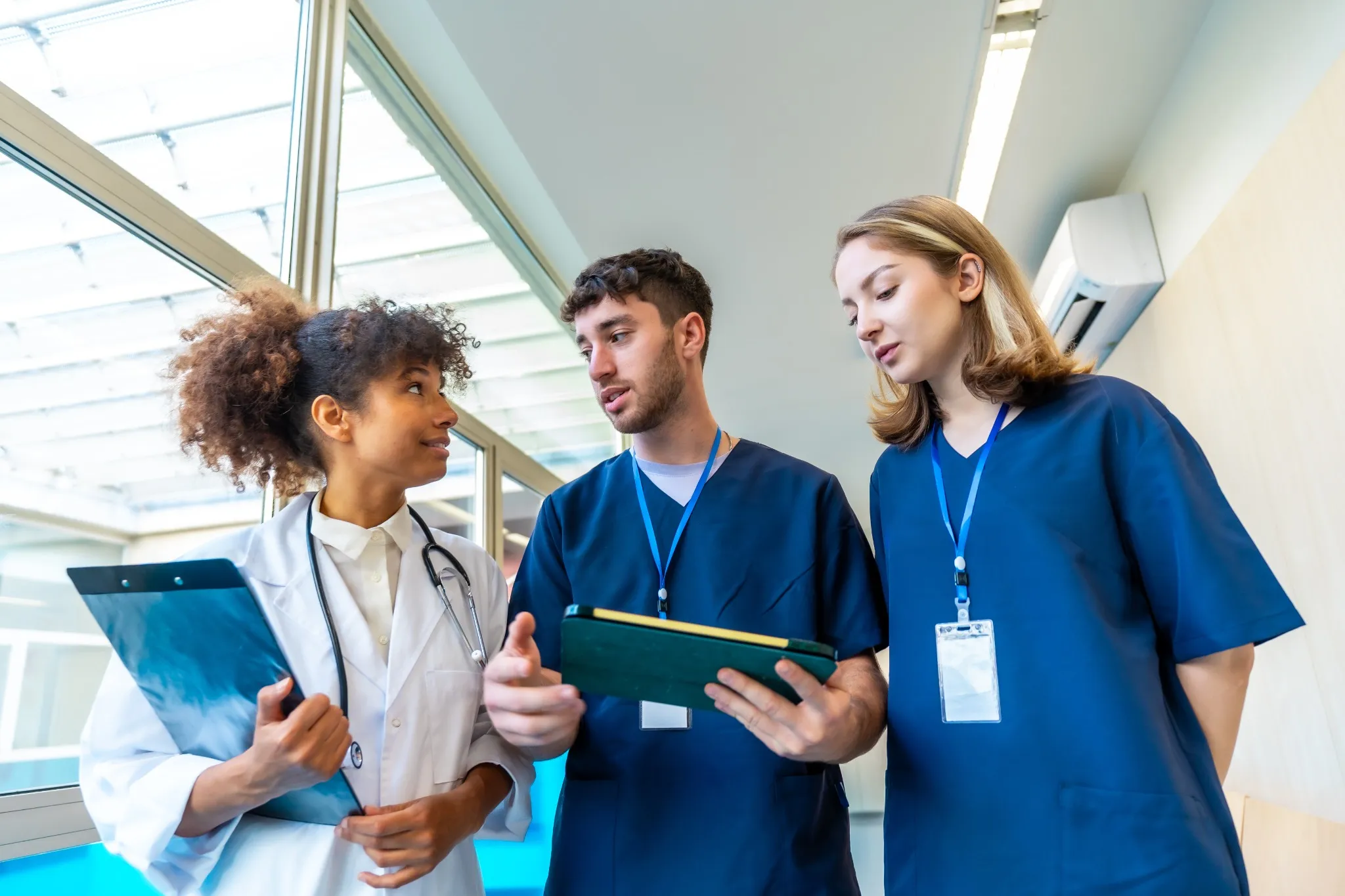 Doctors looking over notes