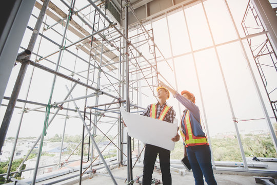 Engineers planning the construction of a building