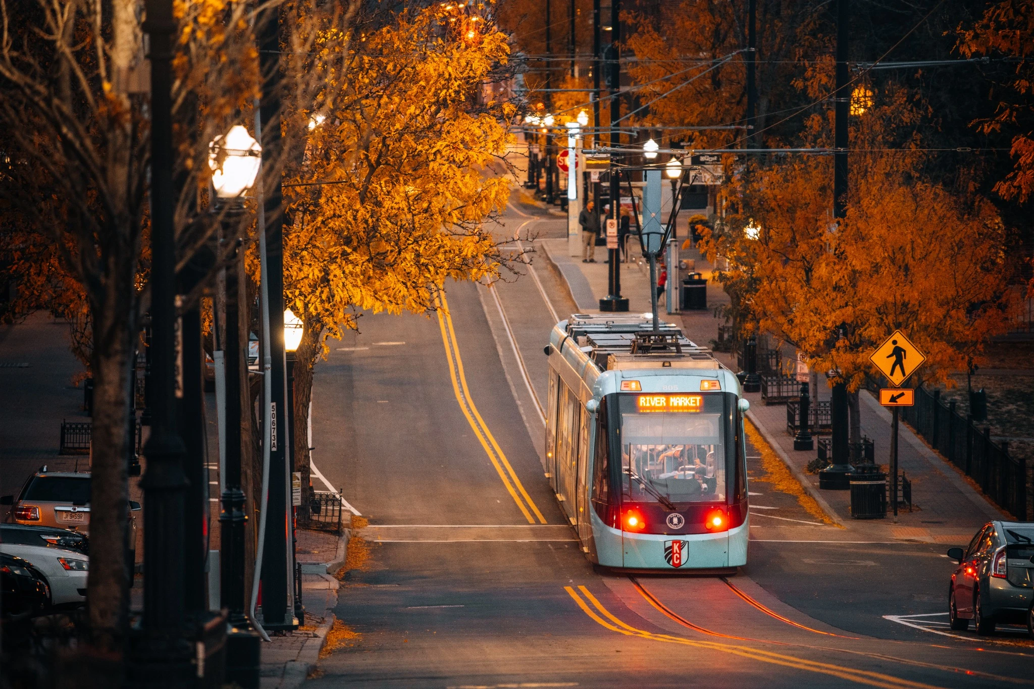 tram in autumn street.