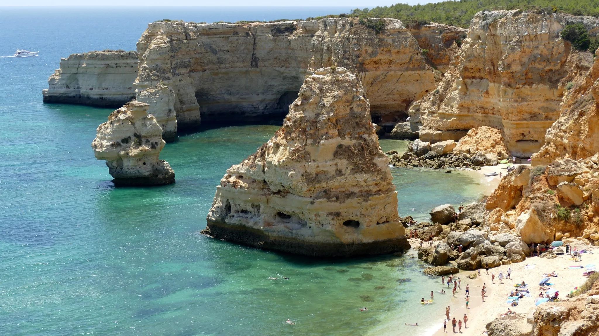 Best beach in Portugal in Algarve near albufeira is full of rocks and sandy coast