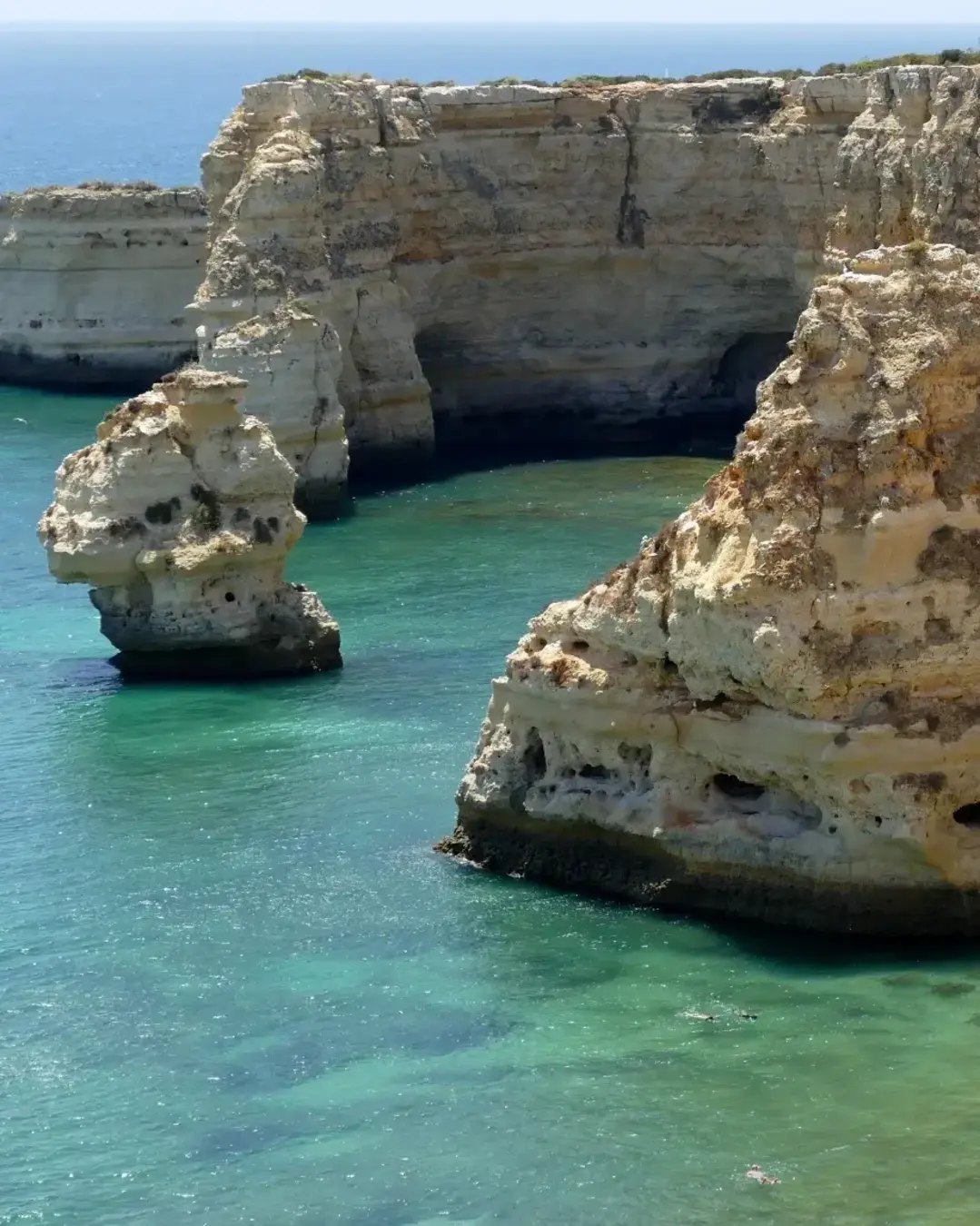 Best beach in Portugal in Algarve near albufeira is full of rocks and sandy coast