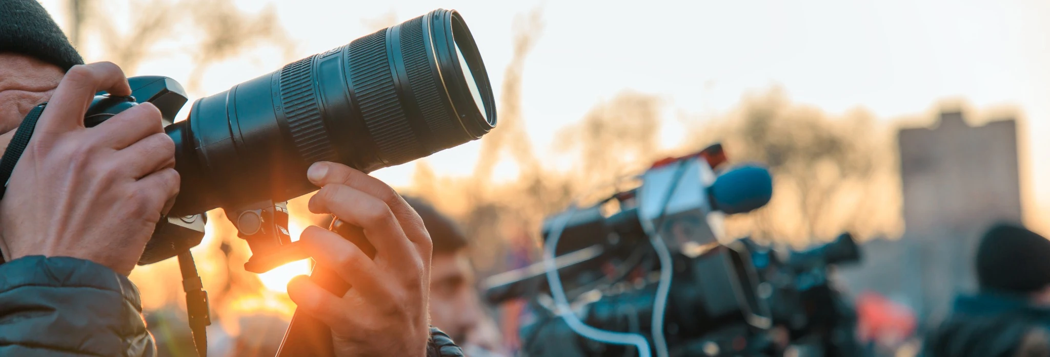 crew filming outdoors at golden hour