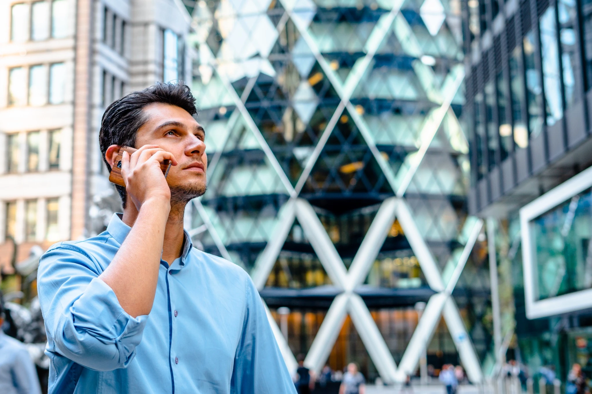 Man working on his phone in London