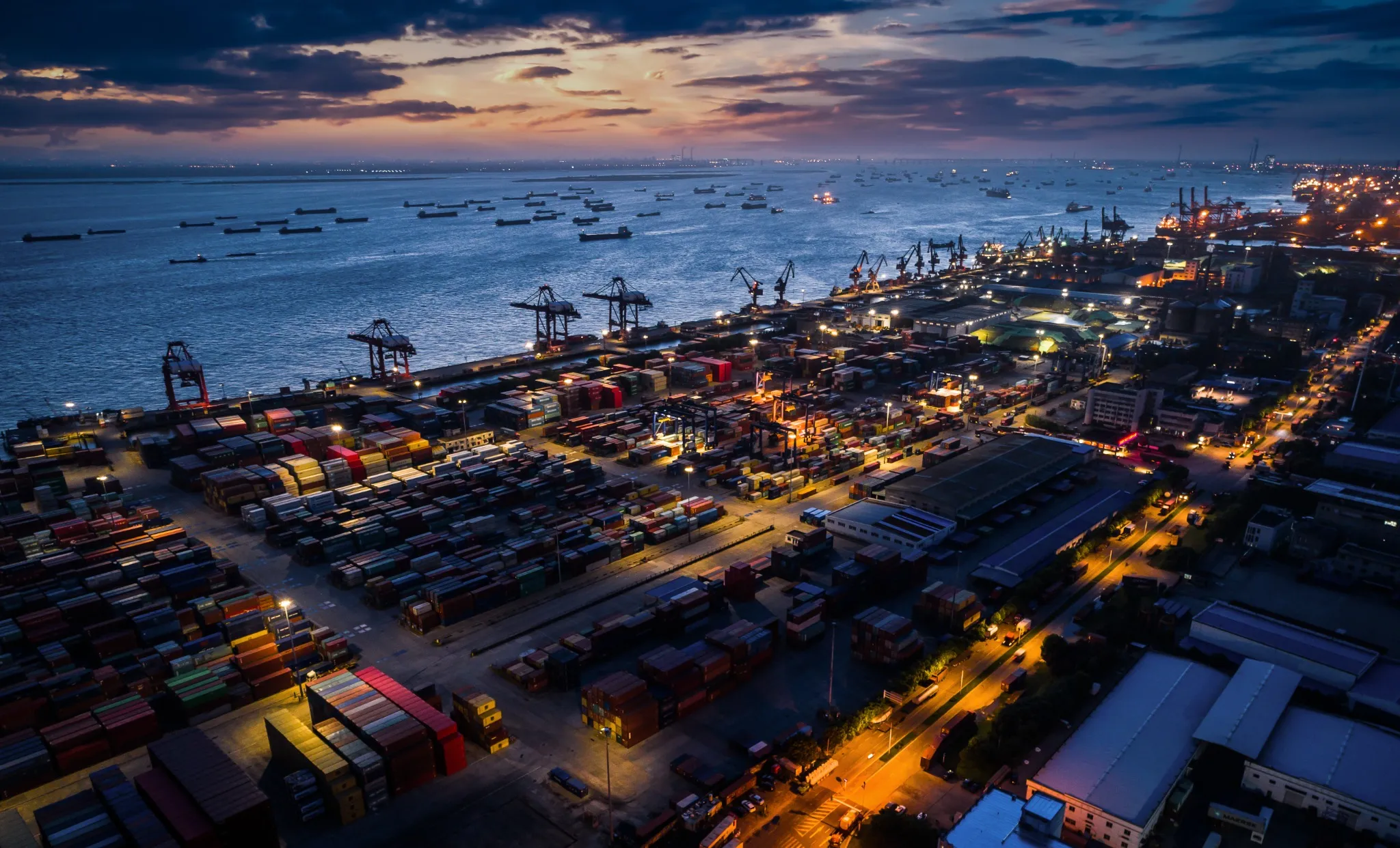 shanghai container terminal at nightfall